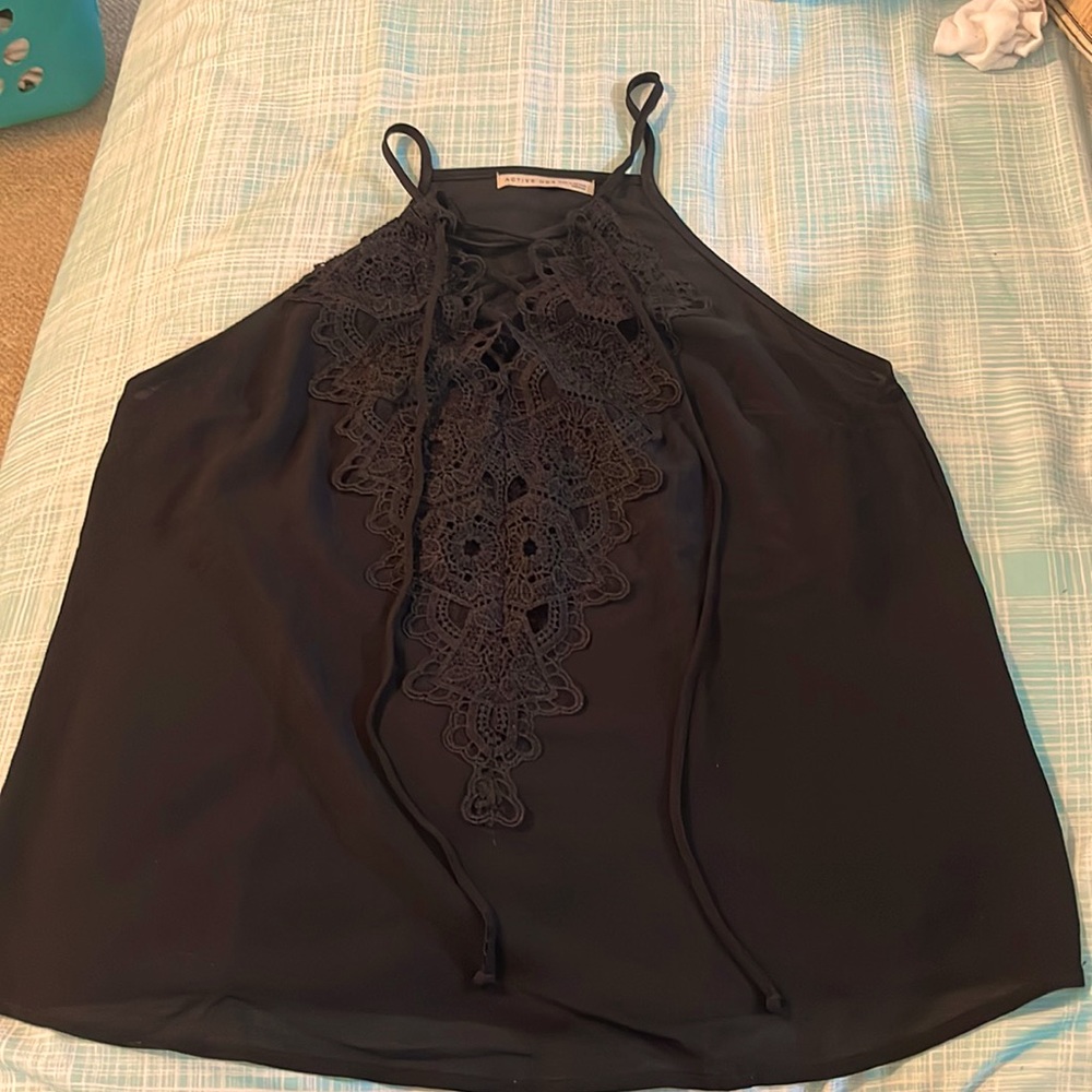 Active USA size medium black tank top with lace detail and lace up front